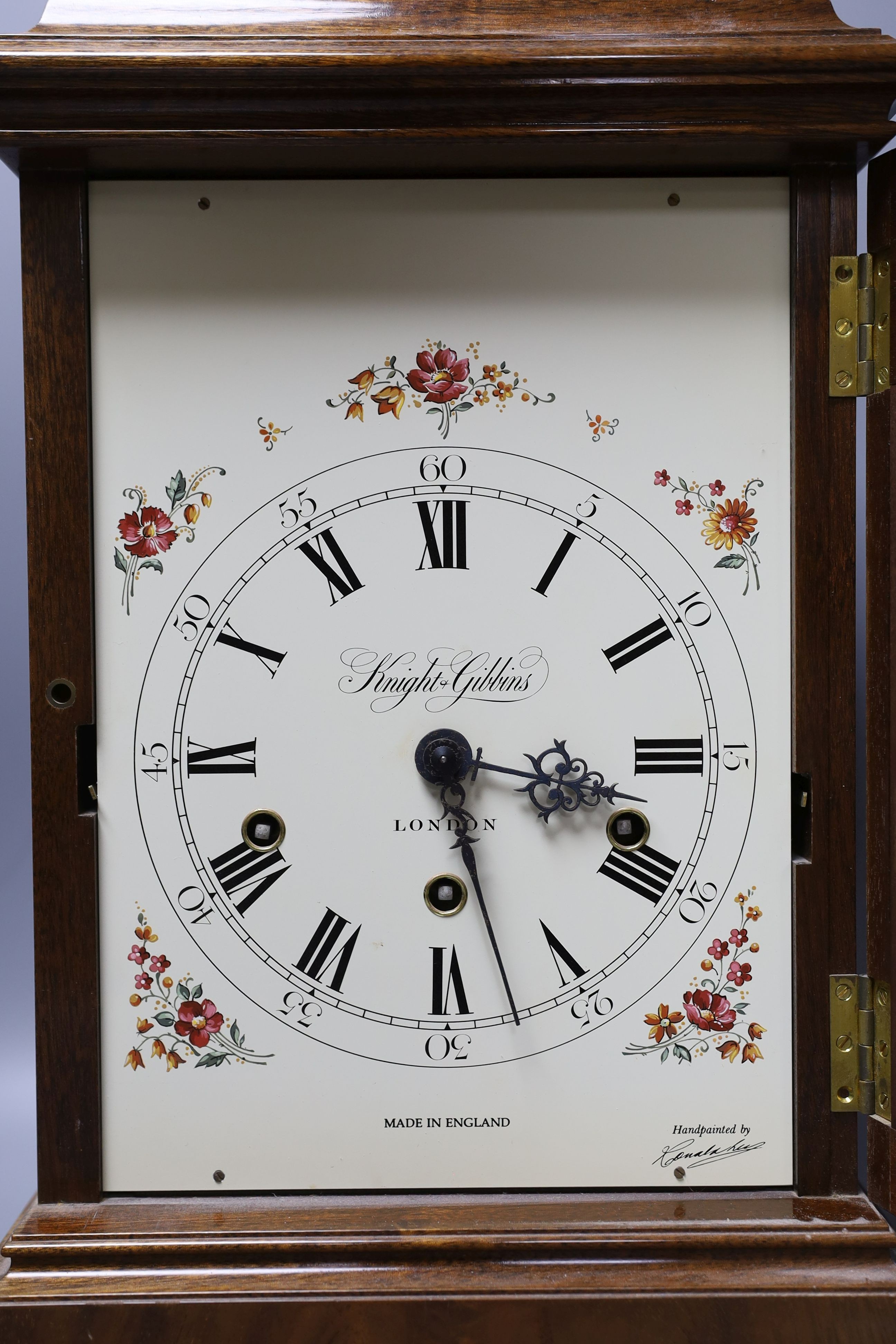 A mahogany chiming mantel clock